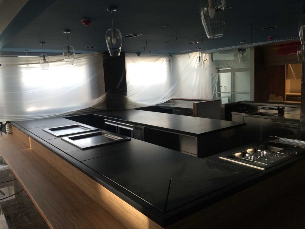 newly installed commercial kitchen and serving tops